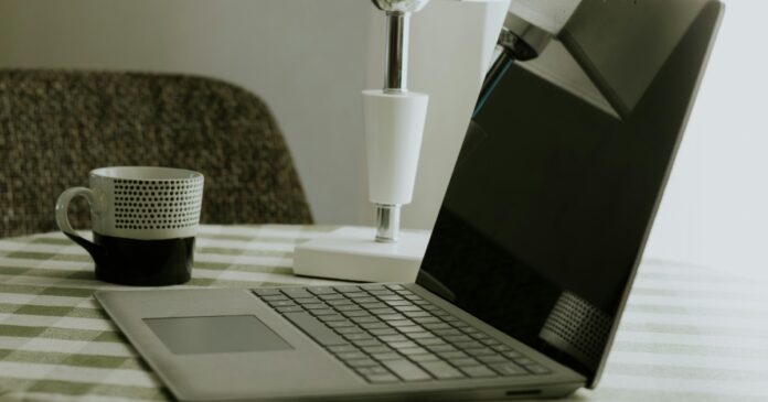 Desk with notebook and workspace items